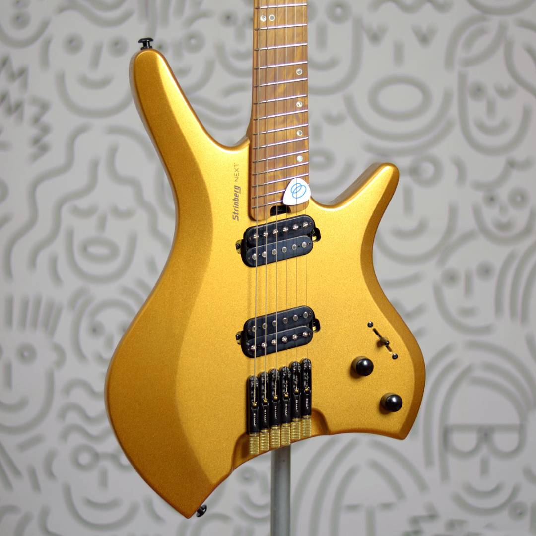Guitarra Strinberg Next SHN6 6 Cordas Multiscale Headless Gold com Bag
