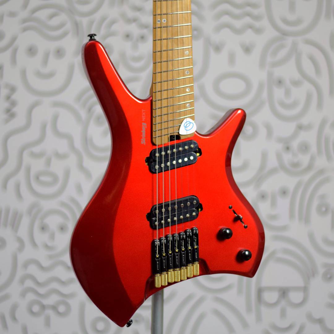 Guitarra Strinberg Next SHN7 7 Cordas Multiscale Headless Red com Bag